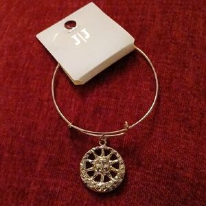 Elegant Gold-Tone Bracelet with Sun Charm